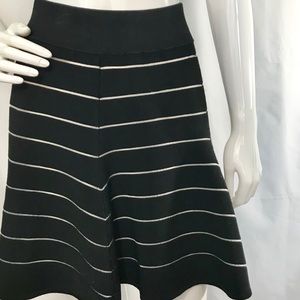 Torn by  Ronny Kobo black and white knit skirt.